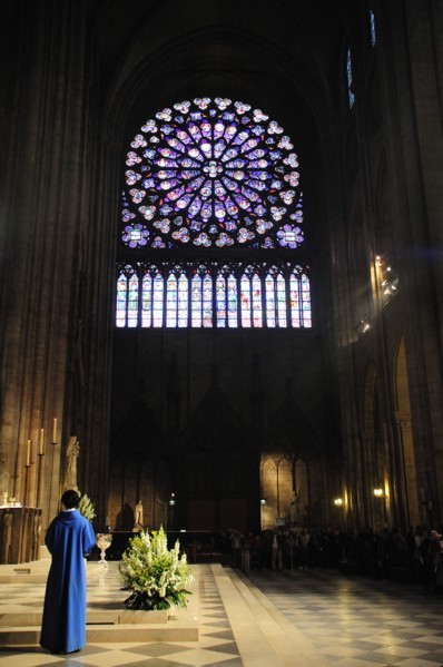 Rear View of Priest in Notre Dame Cathedral