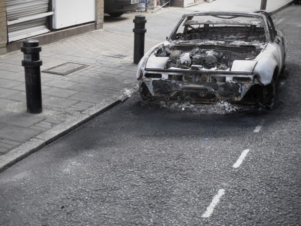 Burnt out Car on Road