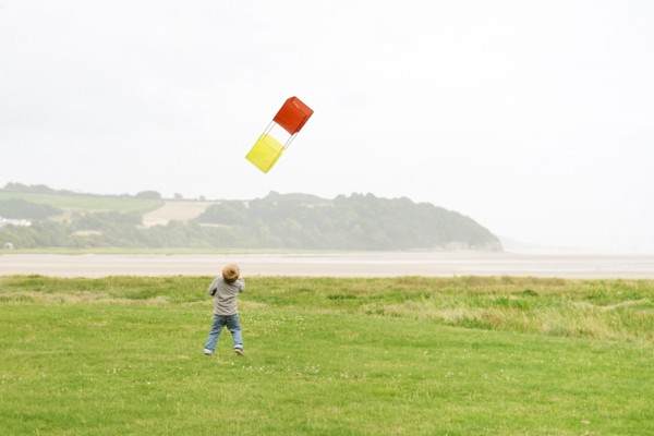 Young Boy Flying Kite