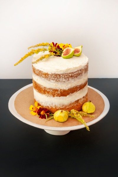 Vanilla Layer Cake Decorated with Edible Fresh Flowers and Fruit