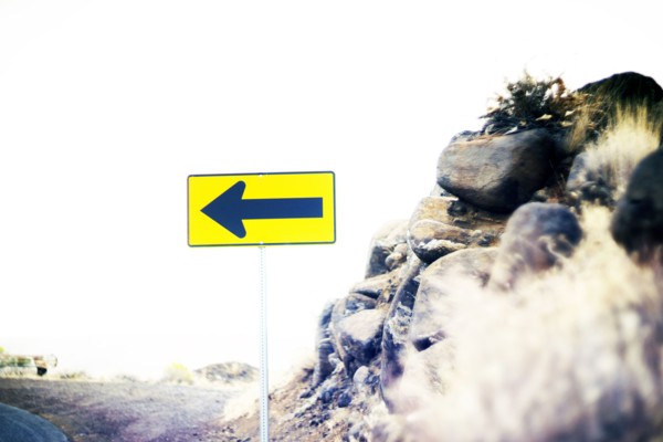 Directional Sign at Edge of Road,,