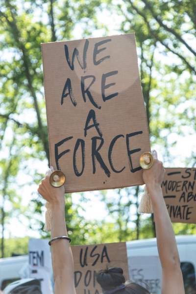 Protester Holding up Sign, "We are a Force" at Black Lives Matter March,