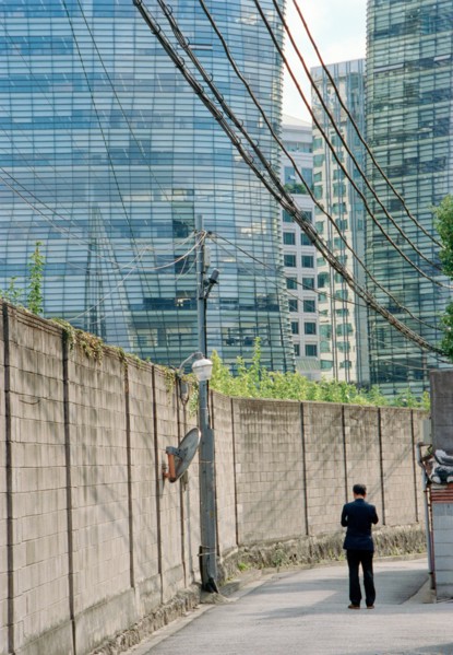 Rear View of Man standing on Street, Seoul,