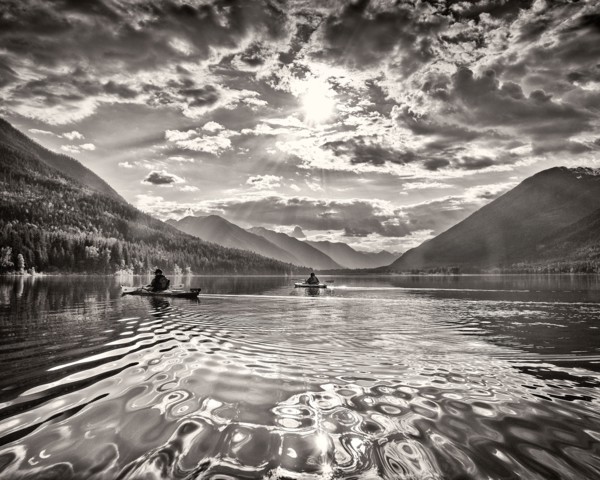 Two Kayakers on Lake with Dramatic Sky,,