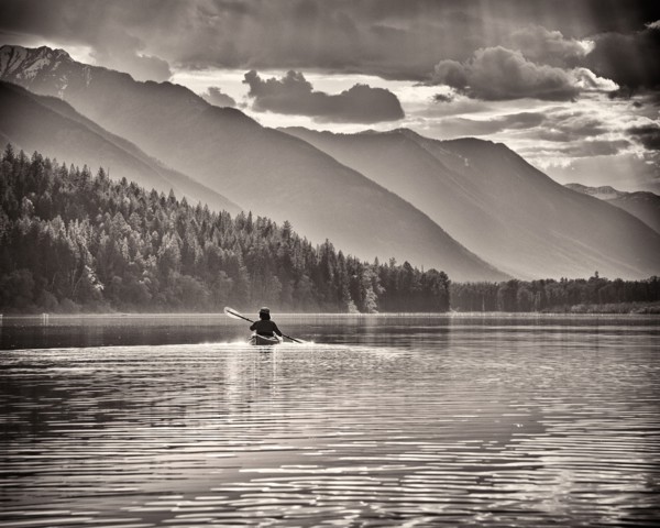 Rear View of Woman Kayaking,,