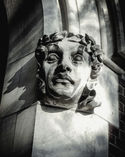 Human Figure Architectural Detail on Building, Close-up,