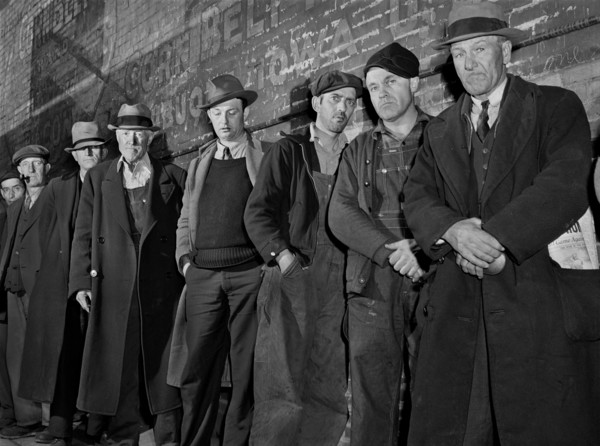 Men waiting in Line outside City Mission, First Twenty-five will be Fed