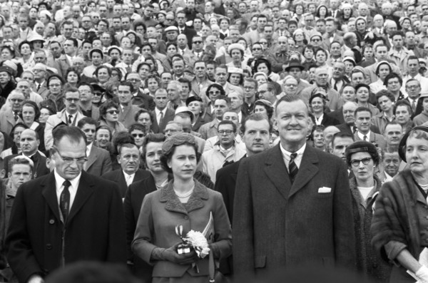 Queen Elizabeth II with Maryland Governor Theodore McKeldin (right) and University of Maryland president Wilson Homer "Bull" Elkins (left), at Maryland Terrapins vs. the North Carolina Tar Heels Footb...