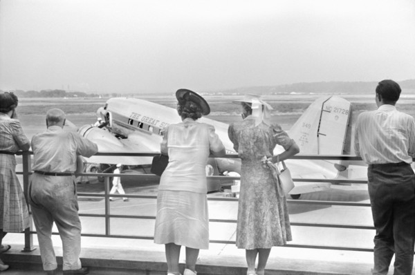 Visitors watching Airplane from Observation Platform