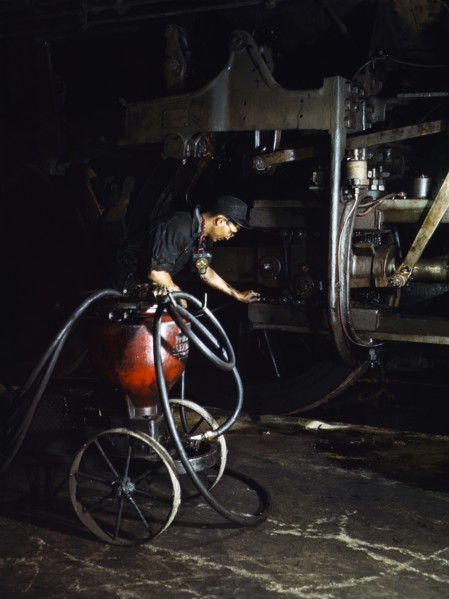 Thomas Madrigal greasing Locomotive Train in Roundhouse