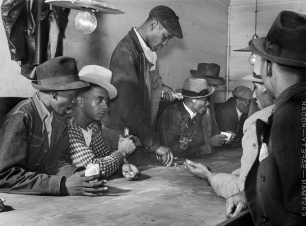 Men spending their money in Gambling and Juke Joint