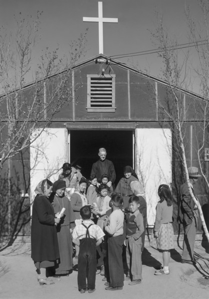 Group of People gathered outside Catholic Church