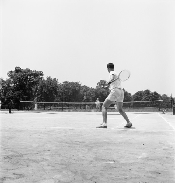 Two Men playing Tennis