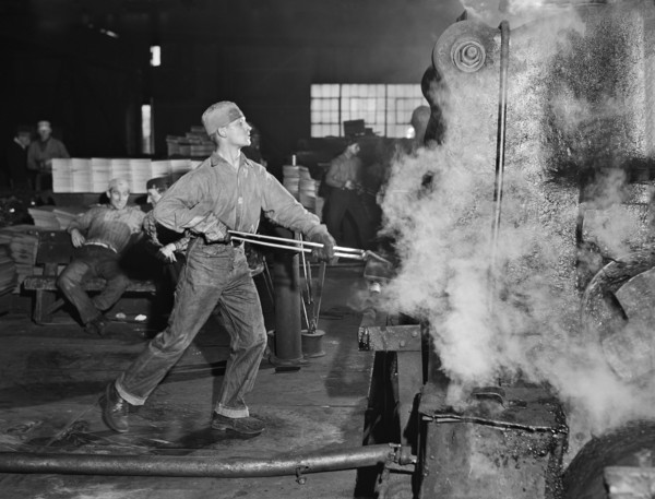 Worker at Rolling Machine