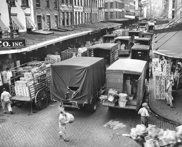 Trucks being loaded with Produce