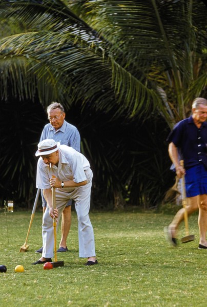 Men playing Croquet
