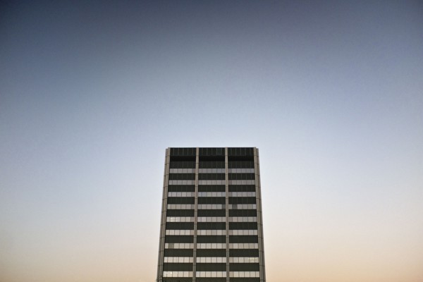 Modern Office Building Exterior against Sky at Dusk