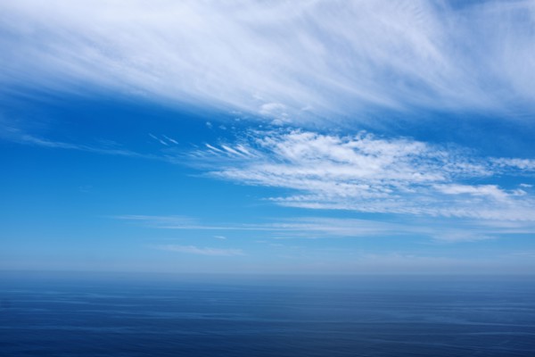 Clouds and blue sky over the Pacific Ocean