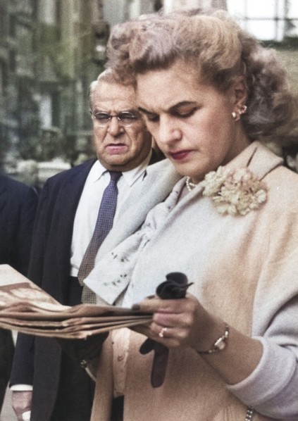 Half-Length Portrait of Woman reading Newspaper on Sidewalk