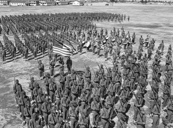 Soldiers of 41st Engineers in formation on Parade Ground with Sergeant Franklin Williams in color guard