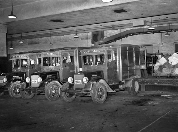 Mail trucks at loading platform