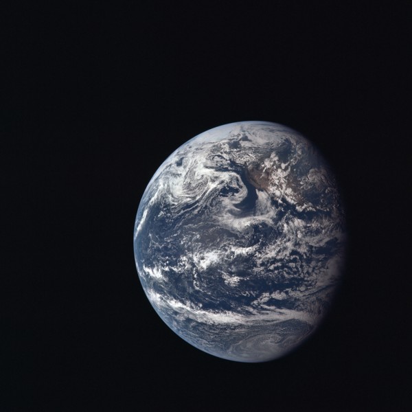 View of Earth taken by Apollo 11 crewmember during its trans-lunar coast toward the moon