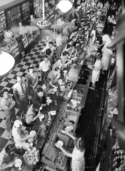 High angle view of lunchtime crowd at noon, People's Drugstore, G Street N.W., Washington, D.C.,