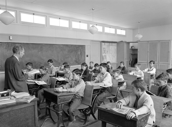 Schoolchildren in classroom at FSA (Farm Security Administration) farm workers' community, Eleven