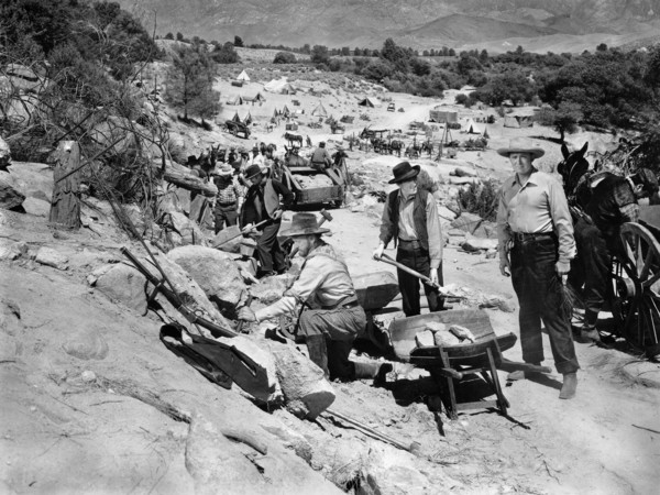 Albert Dekker (right), on-set of the film, "Buckskin Frontier", United Artists, 1943