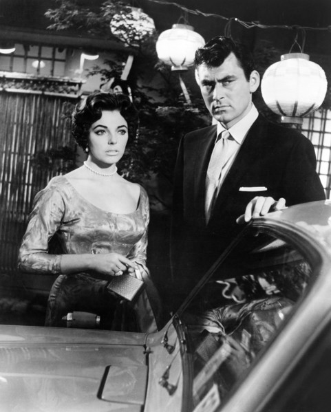 Joan Collins, Ken Scott, on-set of the film, "Stopover Tokyo", 20th Century-Fox, 1957