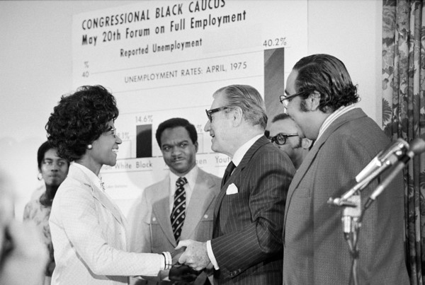 U.S. Vice President Nelson Rockefeller shaking hands with Shirley Chisholm, member of Congressional