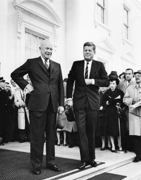 U.S. President Dwight Eisenhower and U.S. President-elect John Kennedy stand before reporters