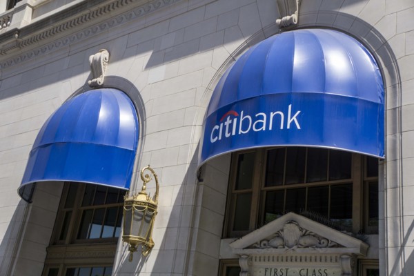 Citibank retail banking office, building exterior with blue awning above windows, New York City,