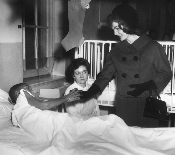 U.S. First Lady Jacqueline Kennedy visiting with patients at Children’s Hospital, Washington D.C.,