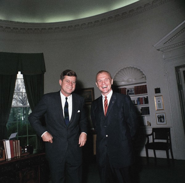 U.S. President John F. Kennedy standing with astronaut John H. Glenn, Jr., Oval Office, White