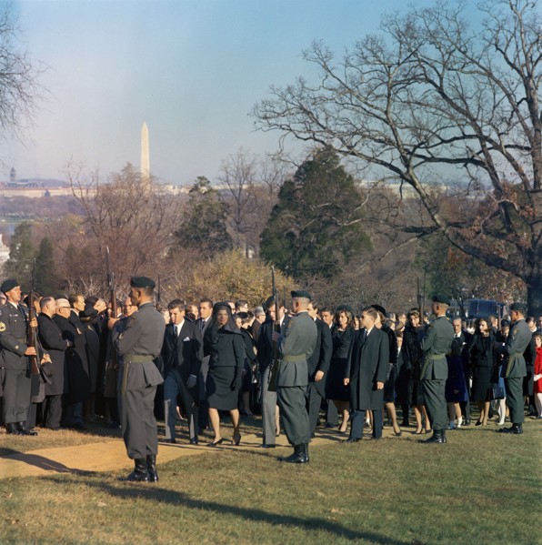 Members of the Kennedy family, led by Jacqueline Kennedy, U.S. Attorney General Robert F. Kennedy