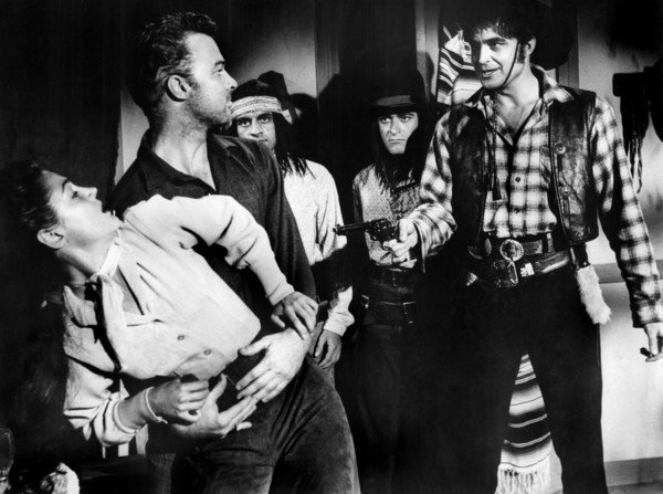 Morgan Jones (left), Joan Taylor (2nd left), Lance Fuller (right), on-set of the western film,