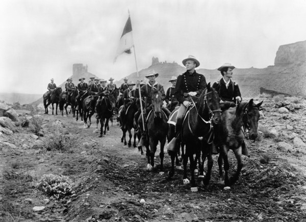 John Lund (foreground, center on horseback), on-set of the western film, "Battle At Apache Pass",