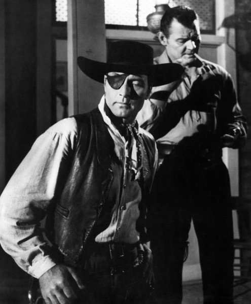 George Montgomery (foreground), Leo Gordon (rear), on-set of the western film, "Black Patch",