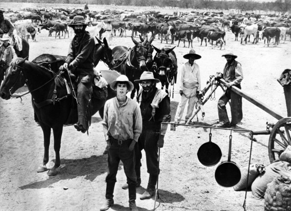 Gary Grimes (foreground, left), Raymond Guth (foreground, right), on-set of the western film, "The