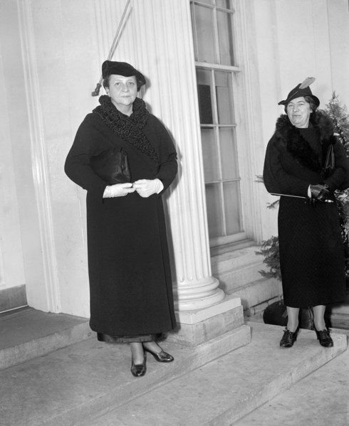U.S. Secretary of Labor Frances Perkins (left), leaving White House after conference with U.S.