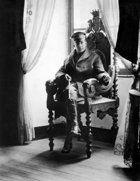 U.S. Brigadier General Douglas MacArthur, seated in the original chair of the old lord of the