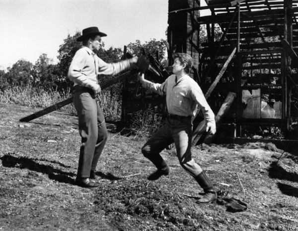 Michael Landon (right), Jack Hogan (left), on-set of the western film, "The Legend Of Tom Dooley",