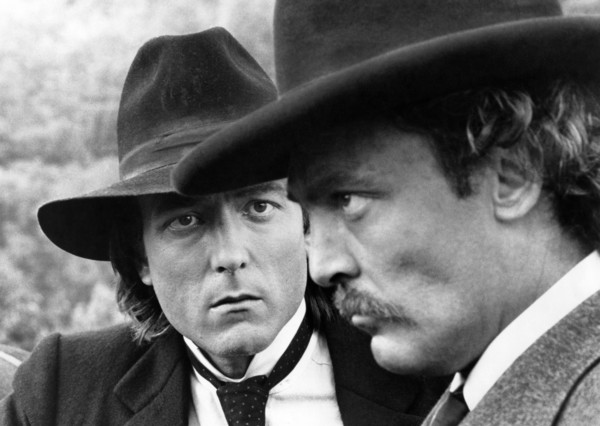 James Keach (left), Stacy Keach (right), on-set of the western film, "The Long Riders", United