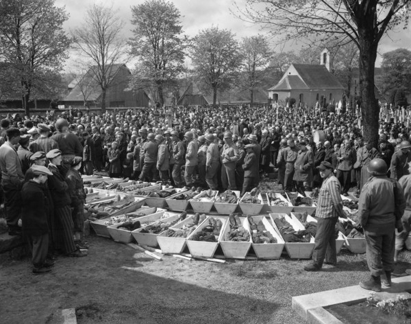 Chaplains of U.S. Third Army conducting burial services for 120 Russian and Polish Jews, victims of