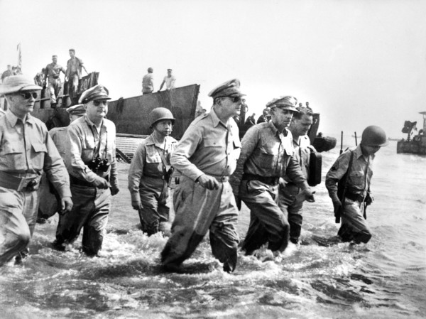 U.S. General Douglas MacArthur wading ashore during initial landings at Leyte Island, Philippine, U