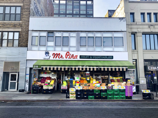 Fruit and vegetable grocery store, building exterior and street scene, Williamsburg, Brooklyn, New