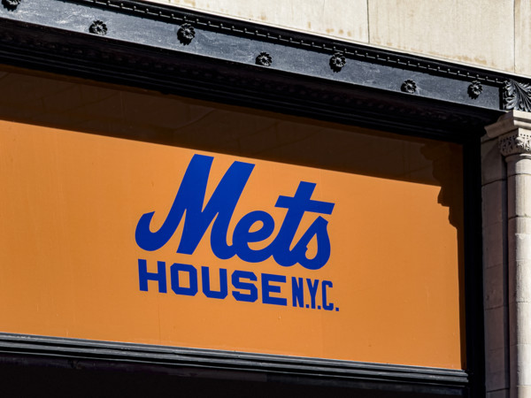 Mets House NYC, pop-up store and activities space, building exterior detail of orange and blue