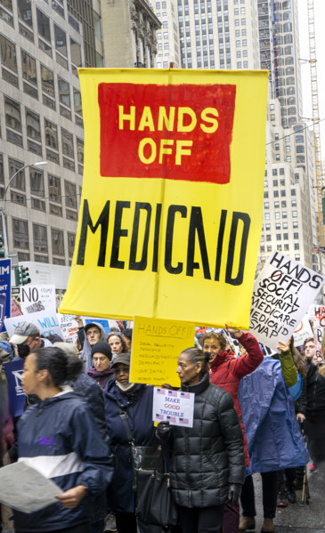 Demonstrators participating in "Hands Off" National Day of Action Protest, New York City, New York,