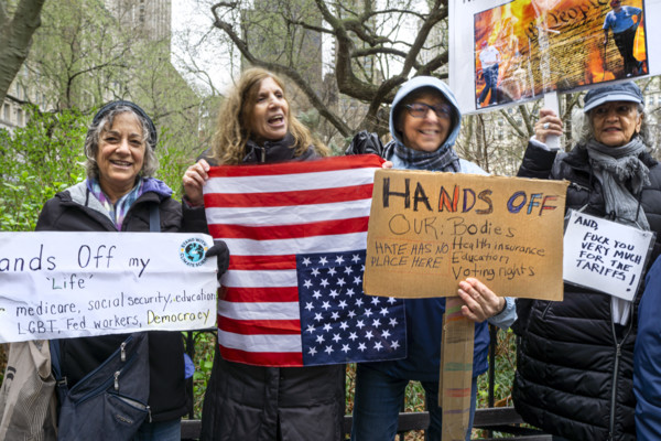 Demonstrators participating in "Hands Off" National Day of Action Protest, New York City, New York,